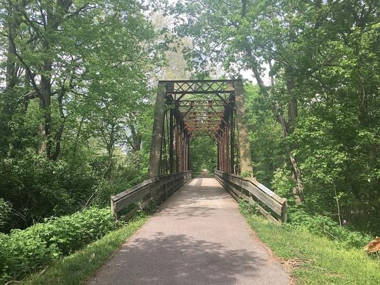 Paved hiking trail over a bridge