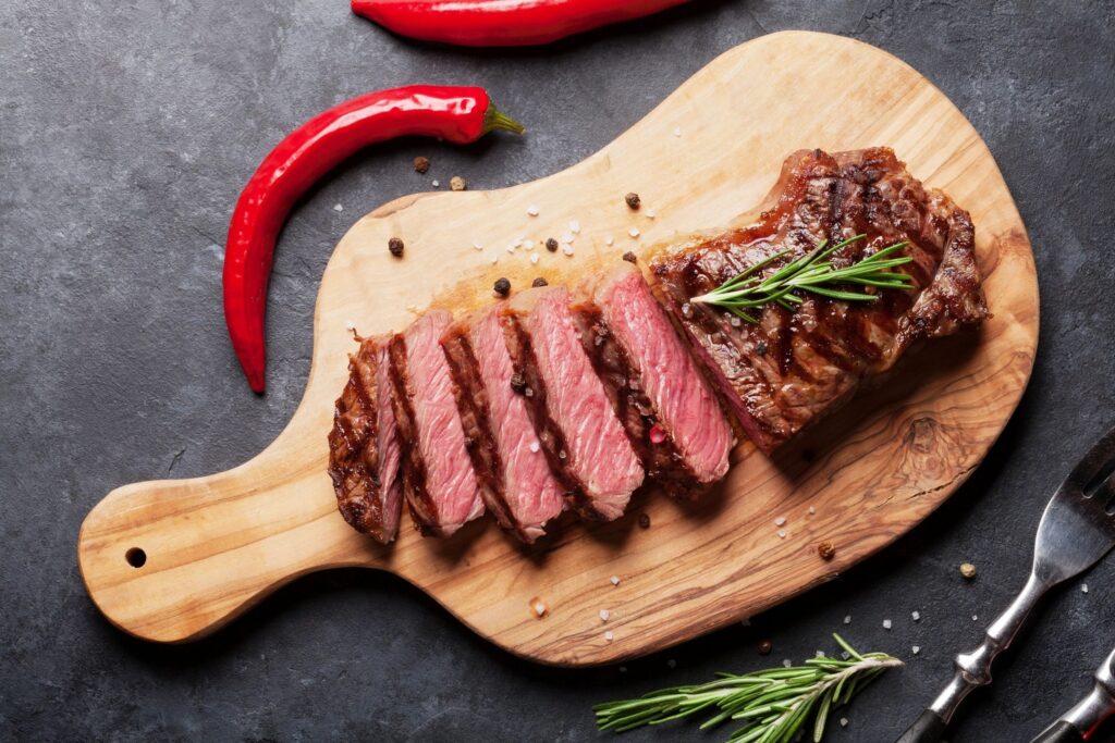 grilled beef slice on a cutting board