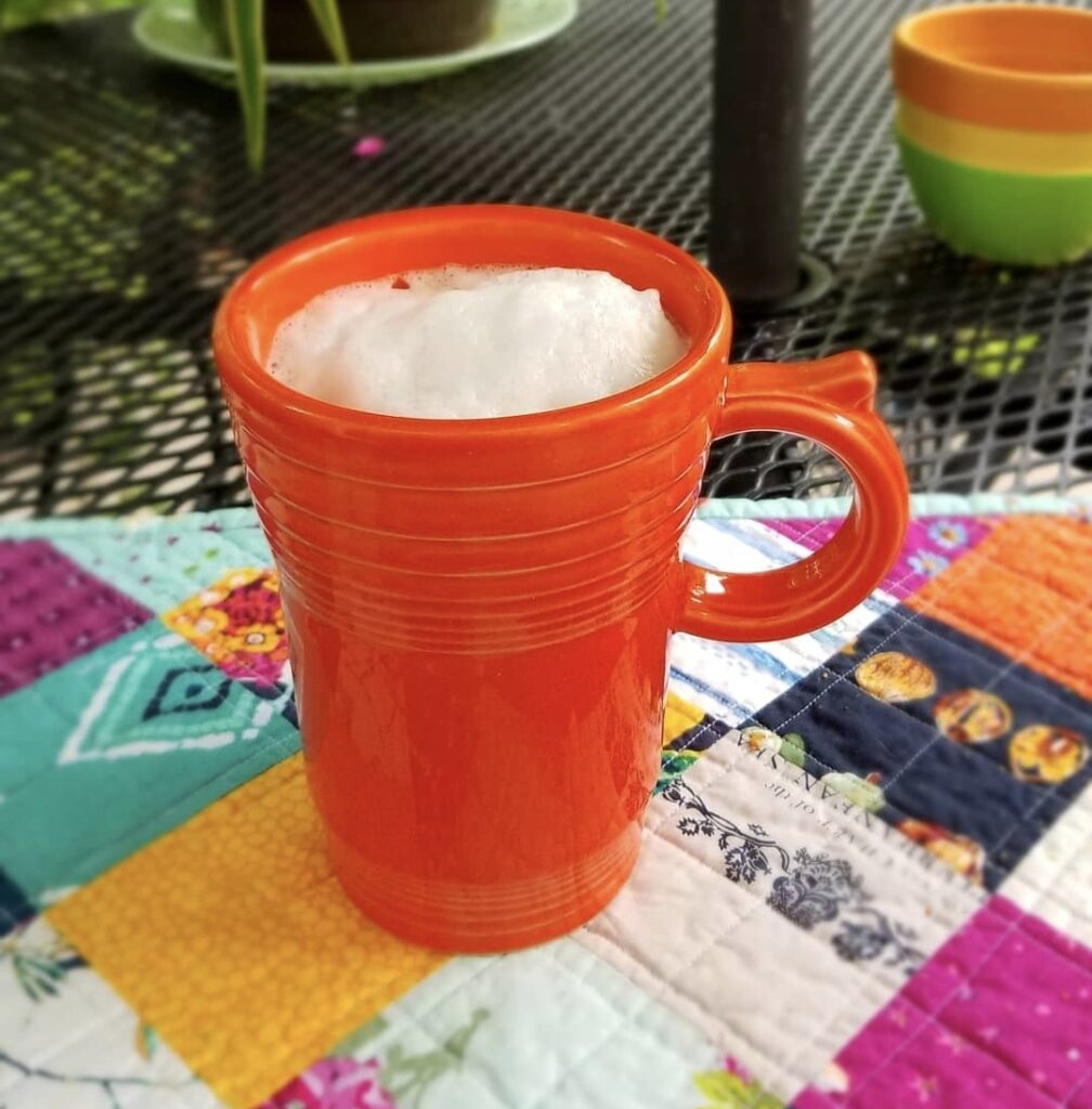 Foamy cup of coffee