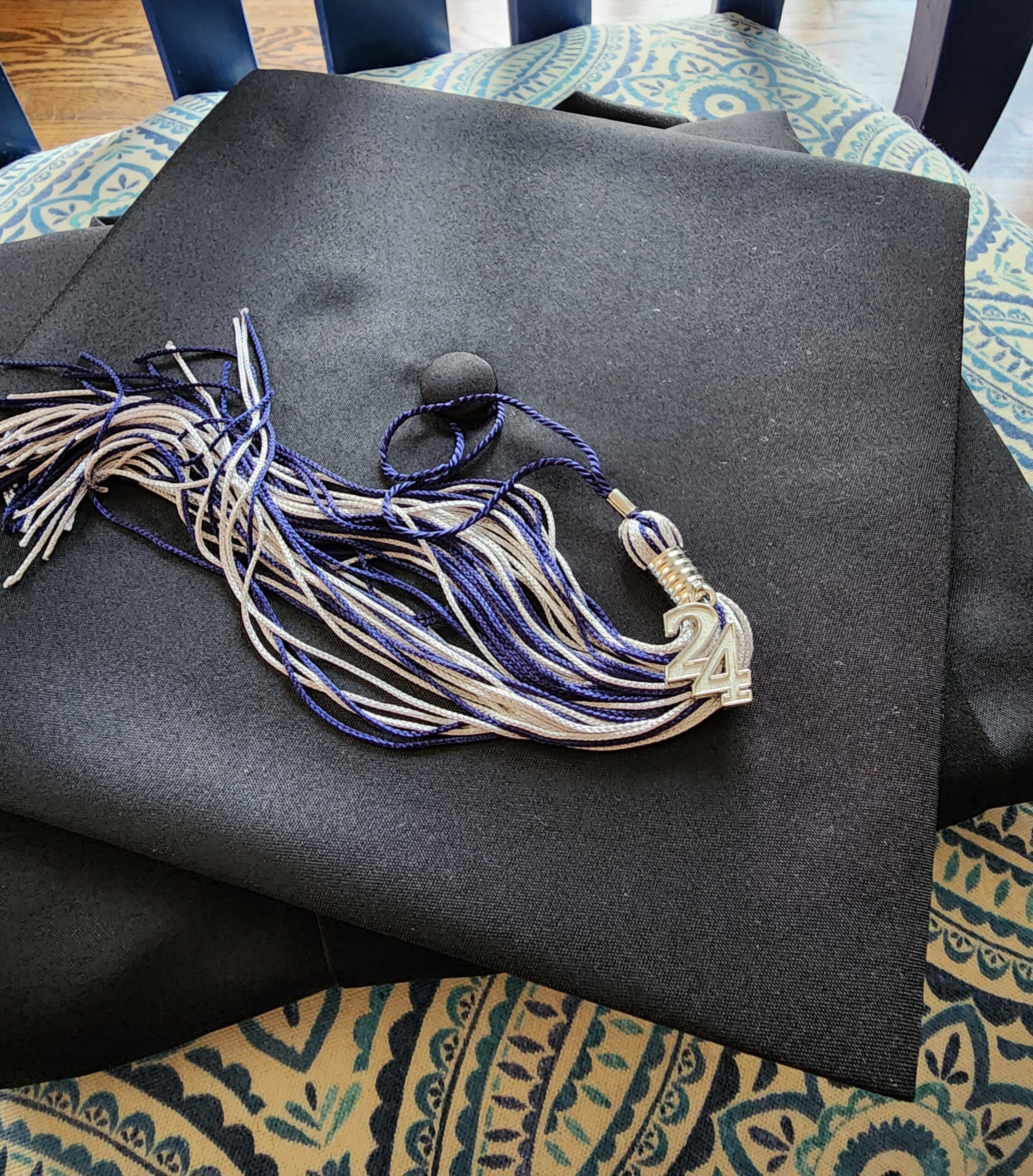 Graduation cap and gown – Completing radiologic technology school and starting a new career.