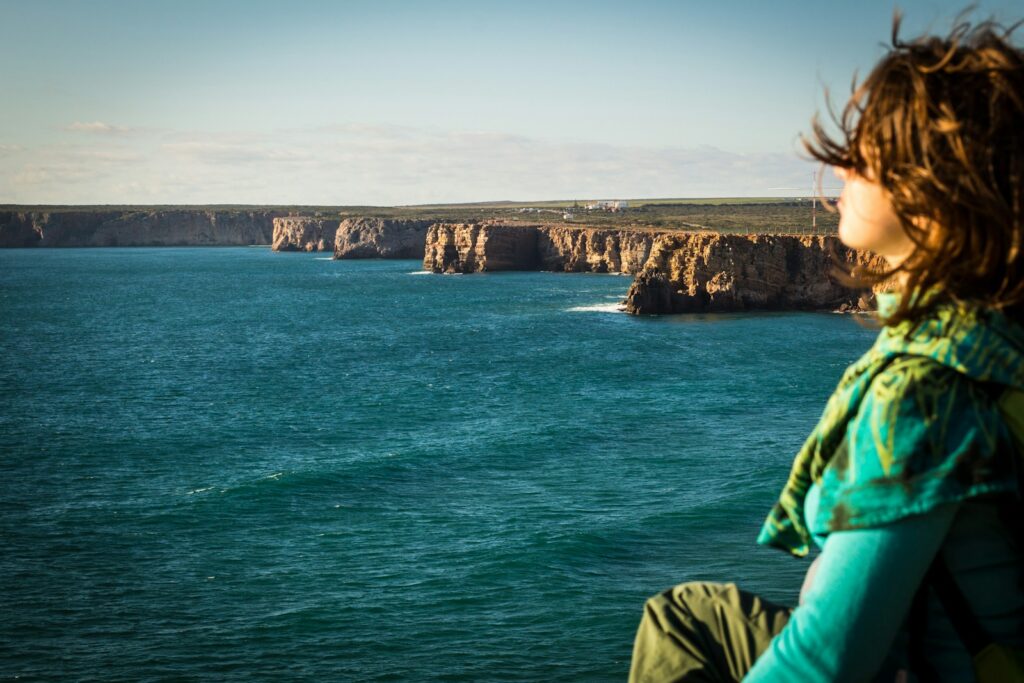 woman sitting at the seashore JUST BREATHE