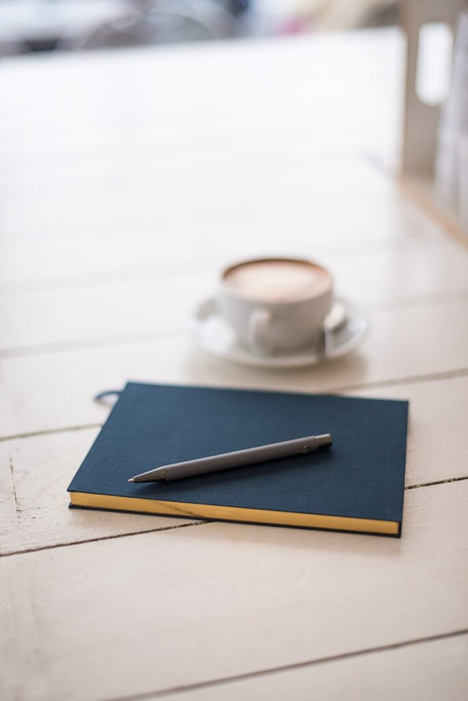 Minimalist daily health tracker and journal with coffee—supporting small, consistent habits.