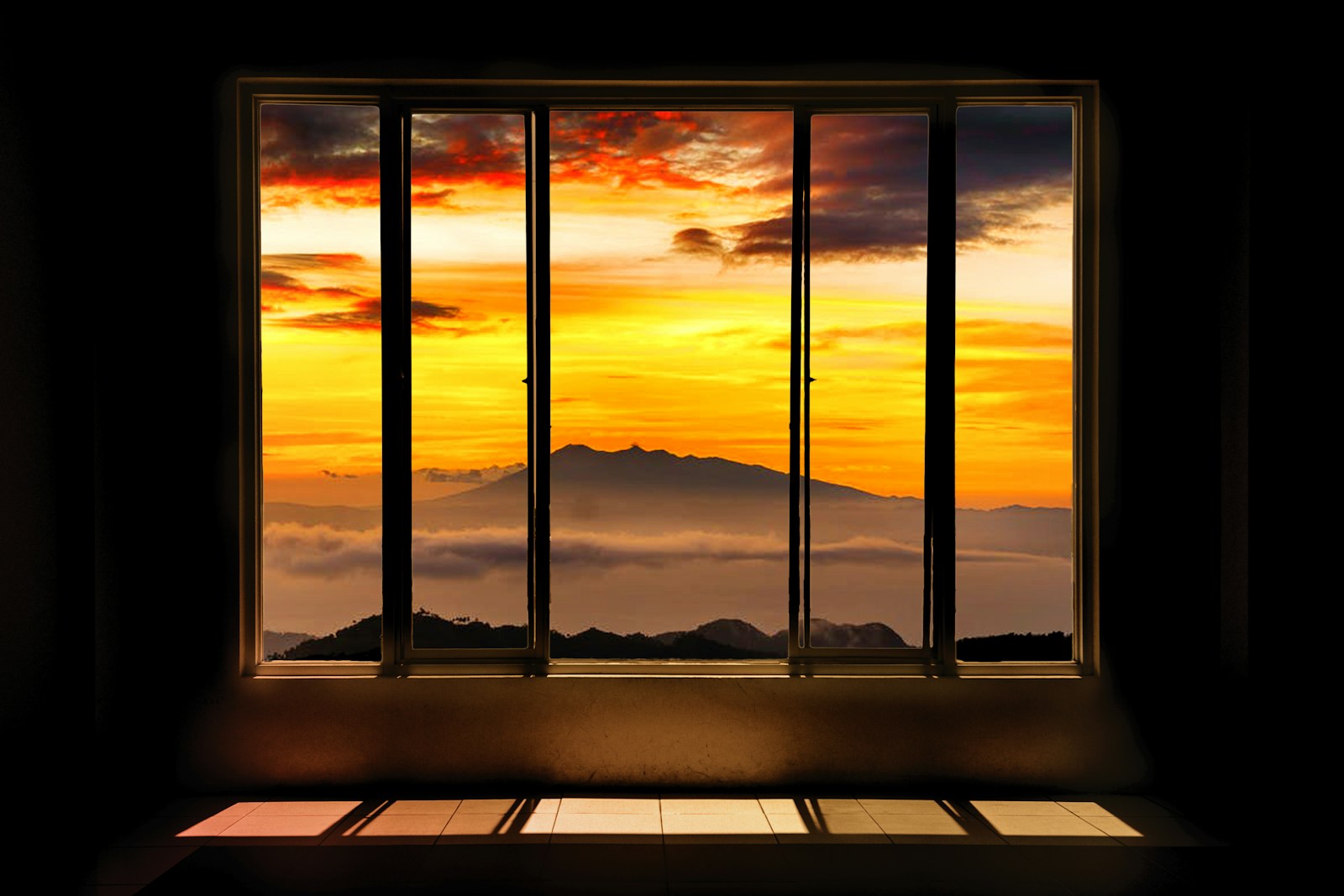 Warm light through a window at sunset, suggesting a quiet moment of reflection and transition.