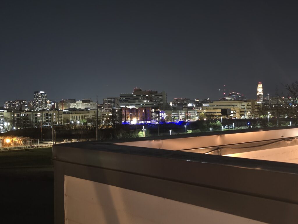 View of the Nashville skyline from a rooftop, capturing a calm and intentional travel moment