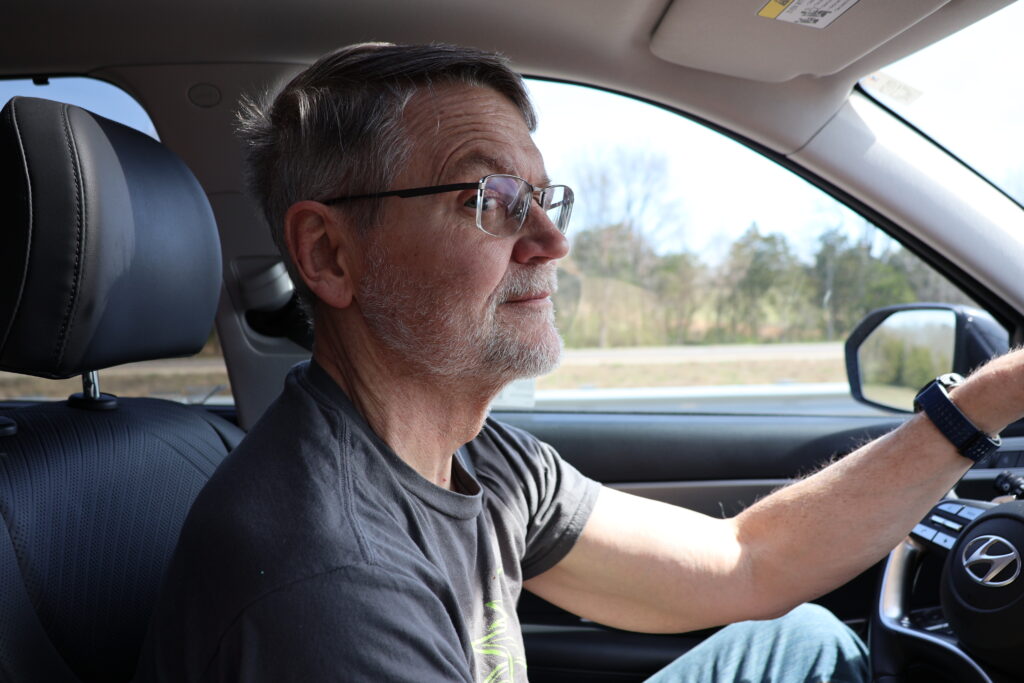 Passenger seat selfie capturing a mindful road trip experience and everyday adventure