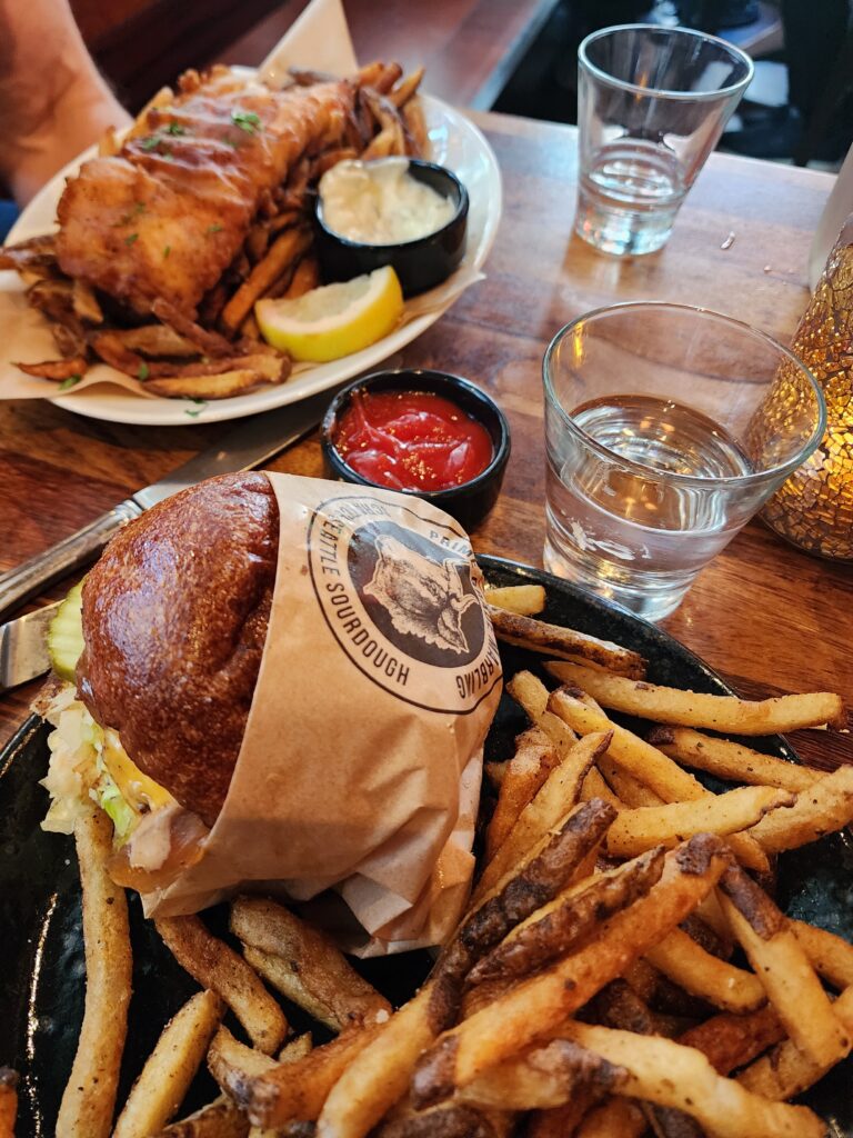 Simple café meal in natural light showing how choosing one intentional anchor can shape a local day into a memorable experience.