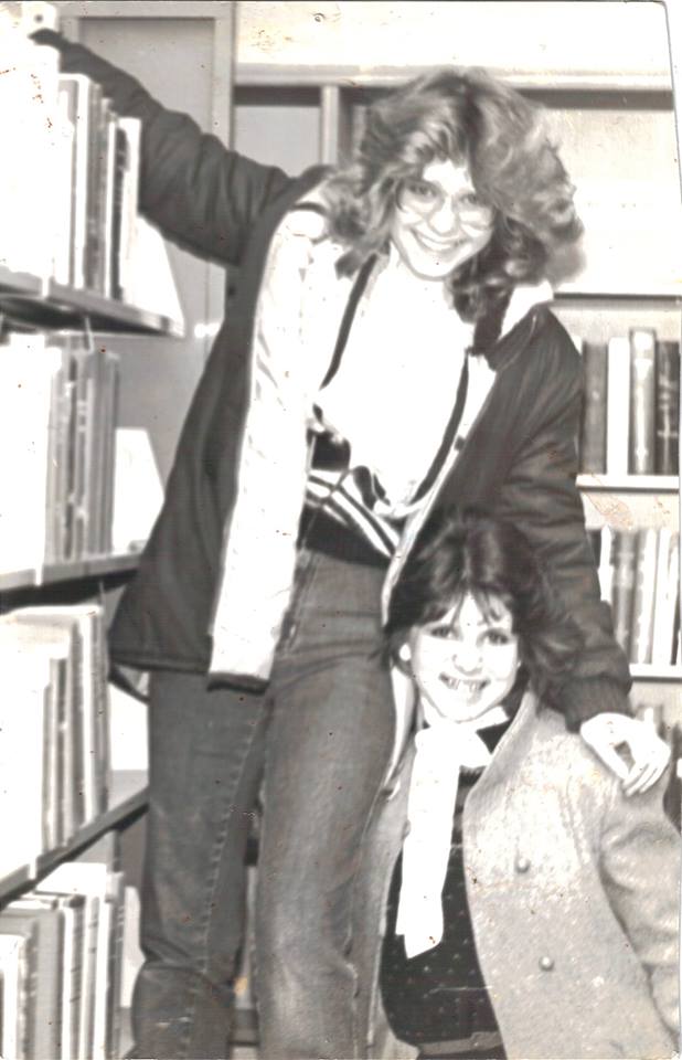 Krista and her high school best friend, photographed in the school library.