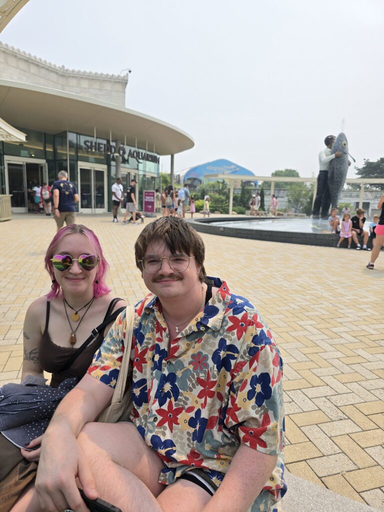 Andi and Elsie outside Shedd Aquarium in Chicago.